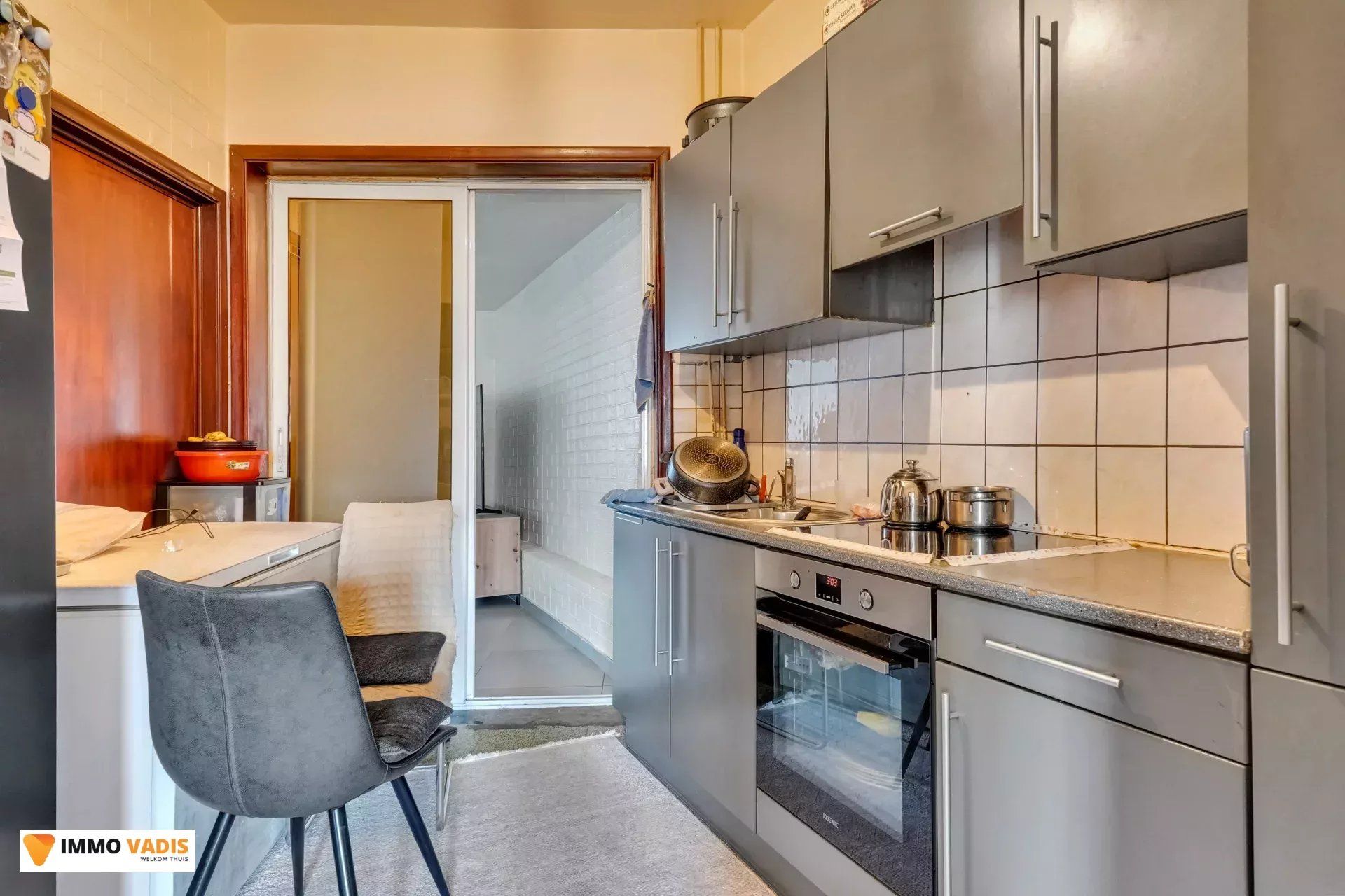 Handelspand met woonst en naastliggende woning foto 14