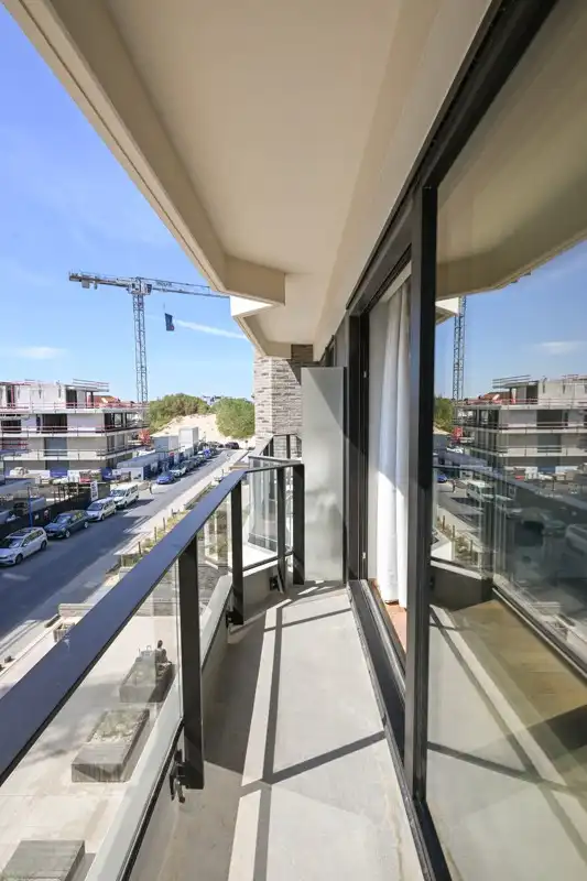 Ruim 1 slaapkamer appartement met zijdelings zeezicht en aankoopmogelijkheid tot een dubbele garage! foto 21