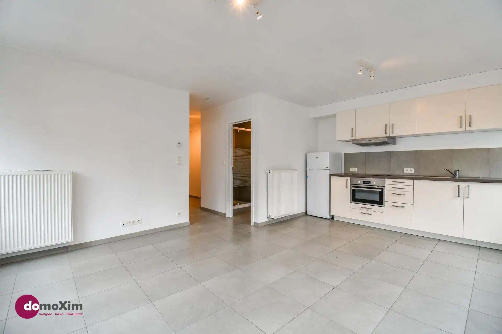 Opbrengsteigendom met 3 appartementen en handelsruimte in het centrum van Mechelen foto 3