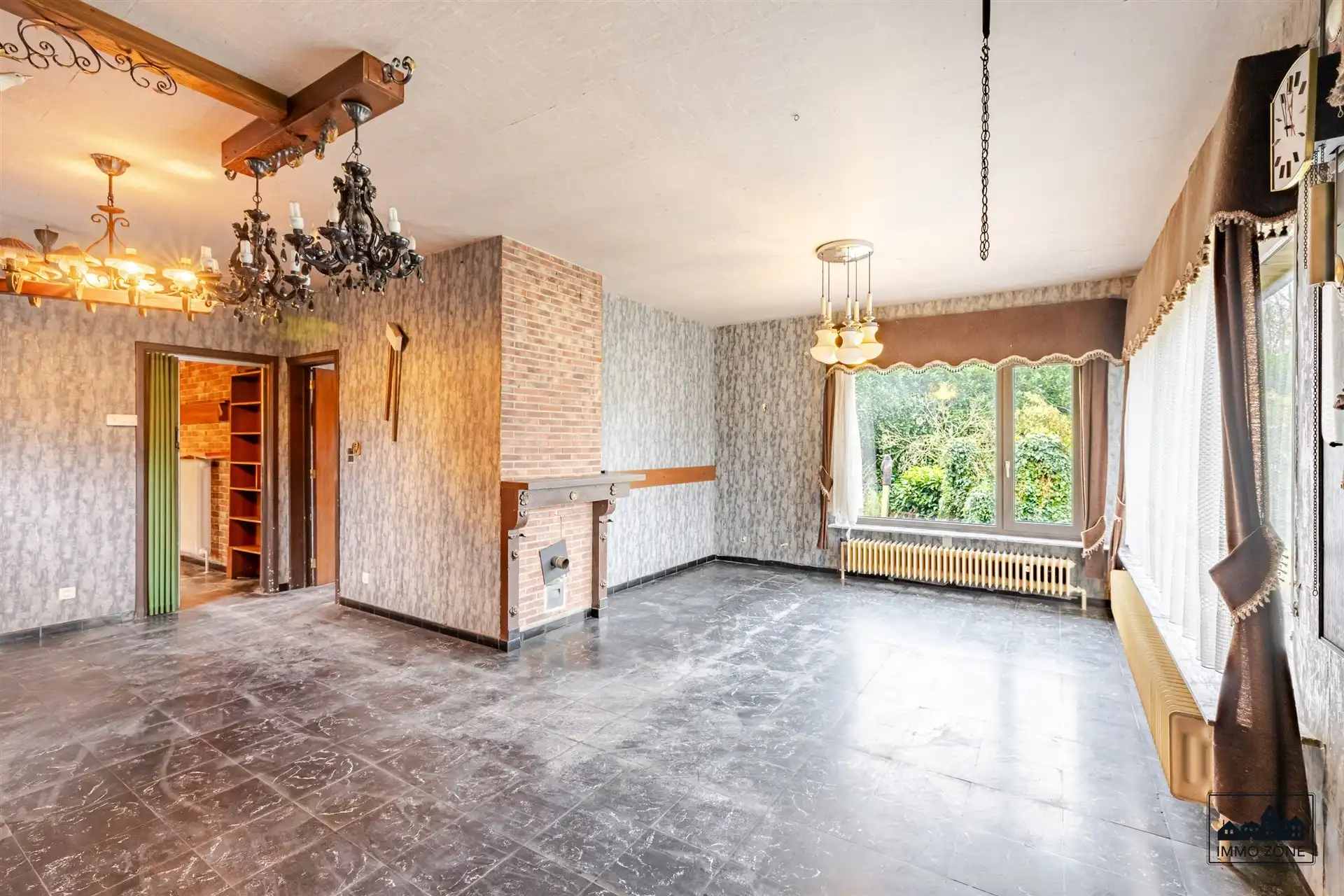 Te renoveren woning op ruim perceel met groene zone foto 4