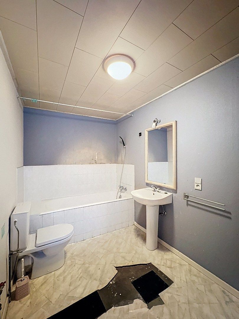 Charmant pand met handelsruimte en woonst in hartje Tienen foto 12