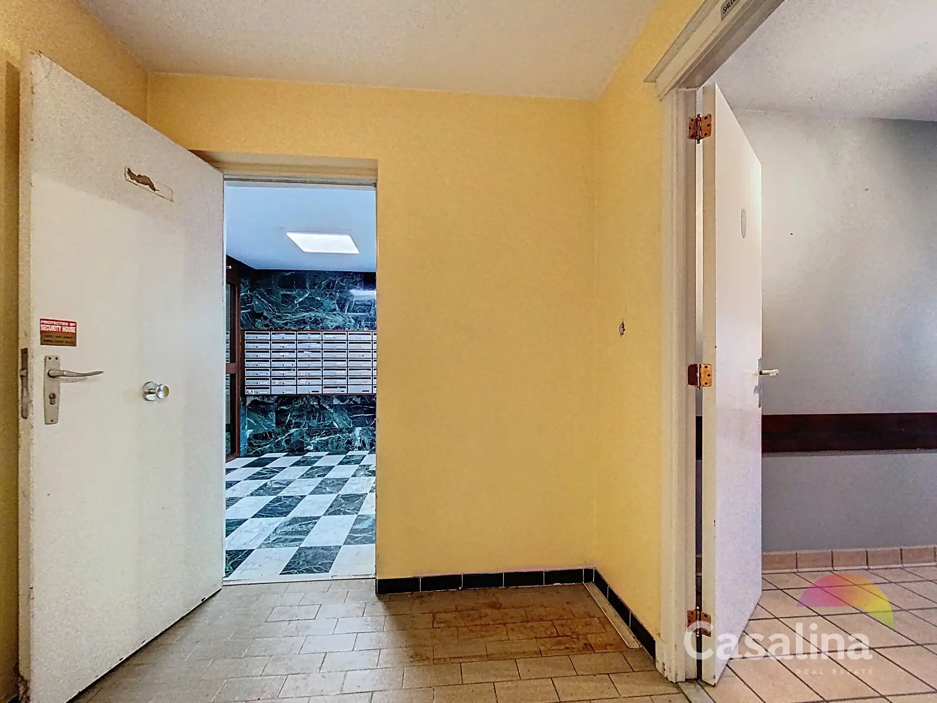 Een gelijkvloerse kantoor, te renoveren van ± 34 m² foto 7