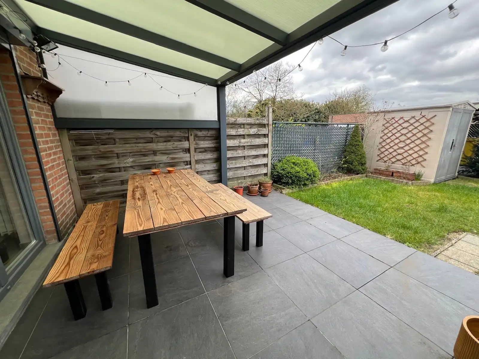 GLV app met 2 slpk, terras, tuin, parking en garagebox foto 11