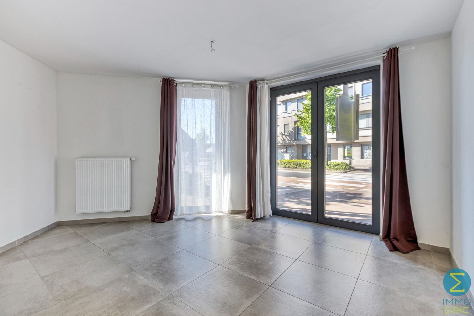 Centraal gelegen ruim gelijkvloers appartement met garage foto 10
