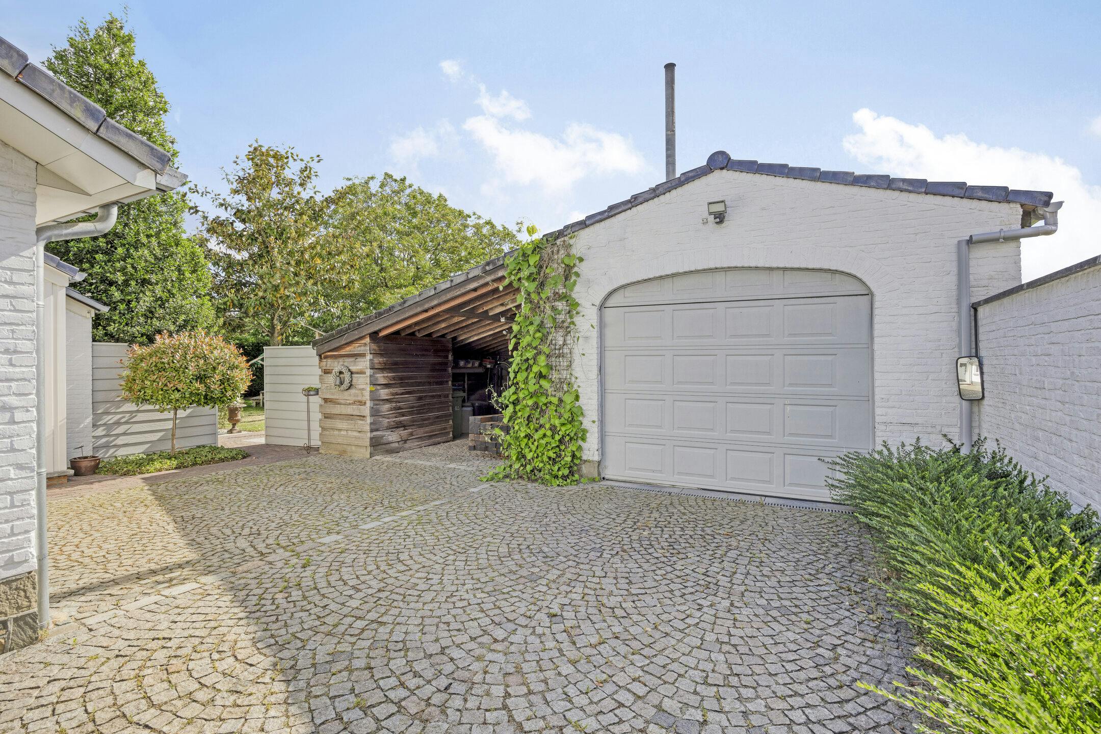 Riante zorgwoning/kangoeroewoning met loods te koop foto 39