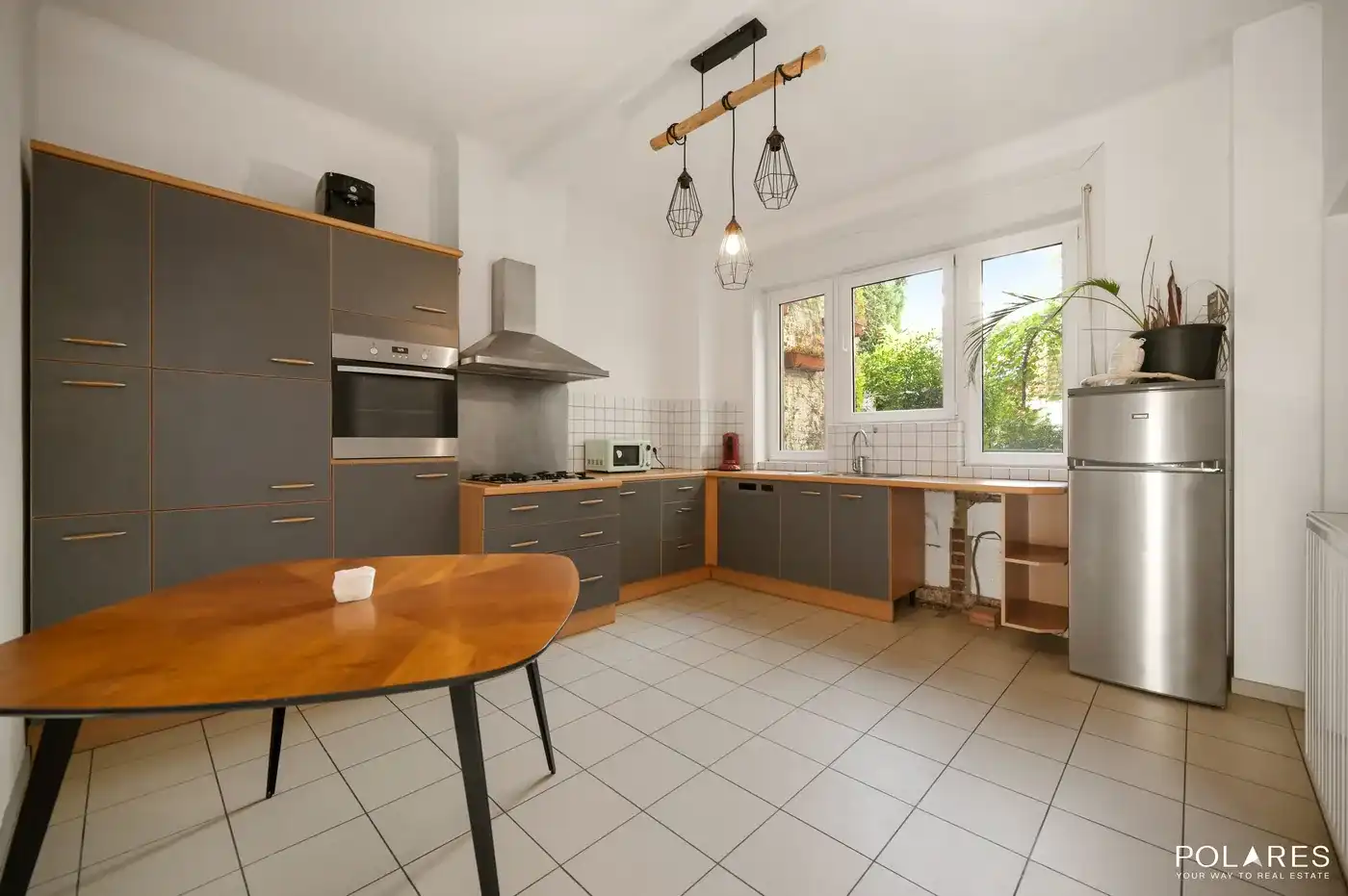 Gelijkvloers appartement met prachtige tuin én polyvalent bijgebouw! foto 8