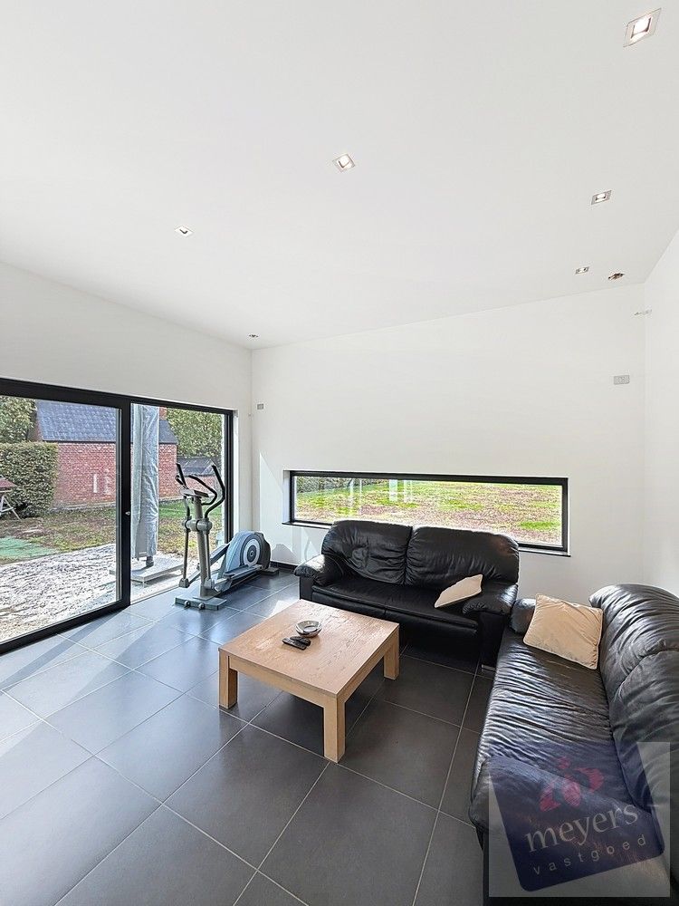 Ruime en energiezuinige gezinswoning met praktijk-/handelsruimte op toplocatie in Spalbeek foto 4