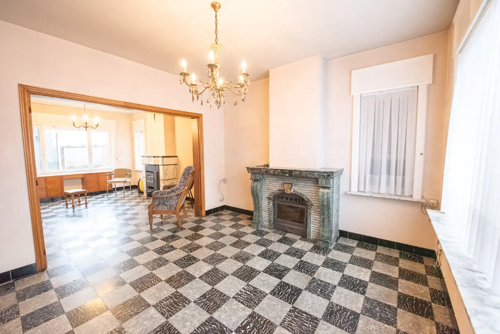 Te koop in Waregem – Halfopen bebouwing met renovatiepotentieel! foto 2