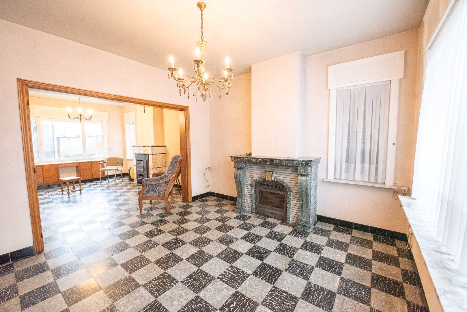 Te koop in Waregem – Halfopen bebouwing met renovatiepotentieel! foto 2