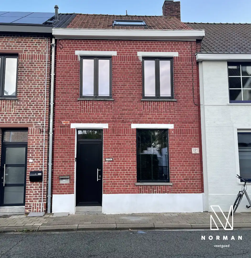 Gezellige woning met stadstuin en overdekt terras foto {{pictureIndex}}