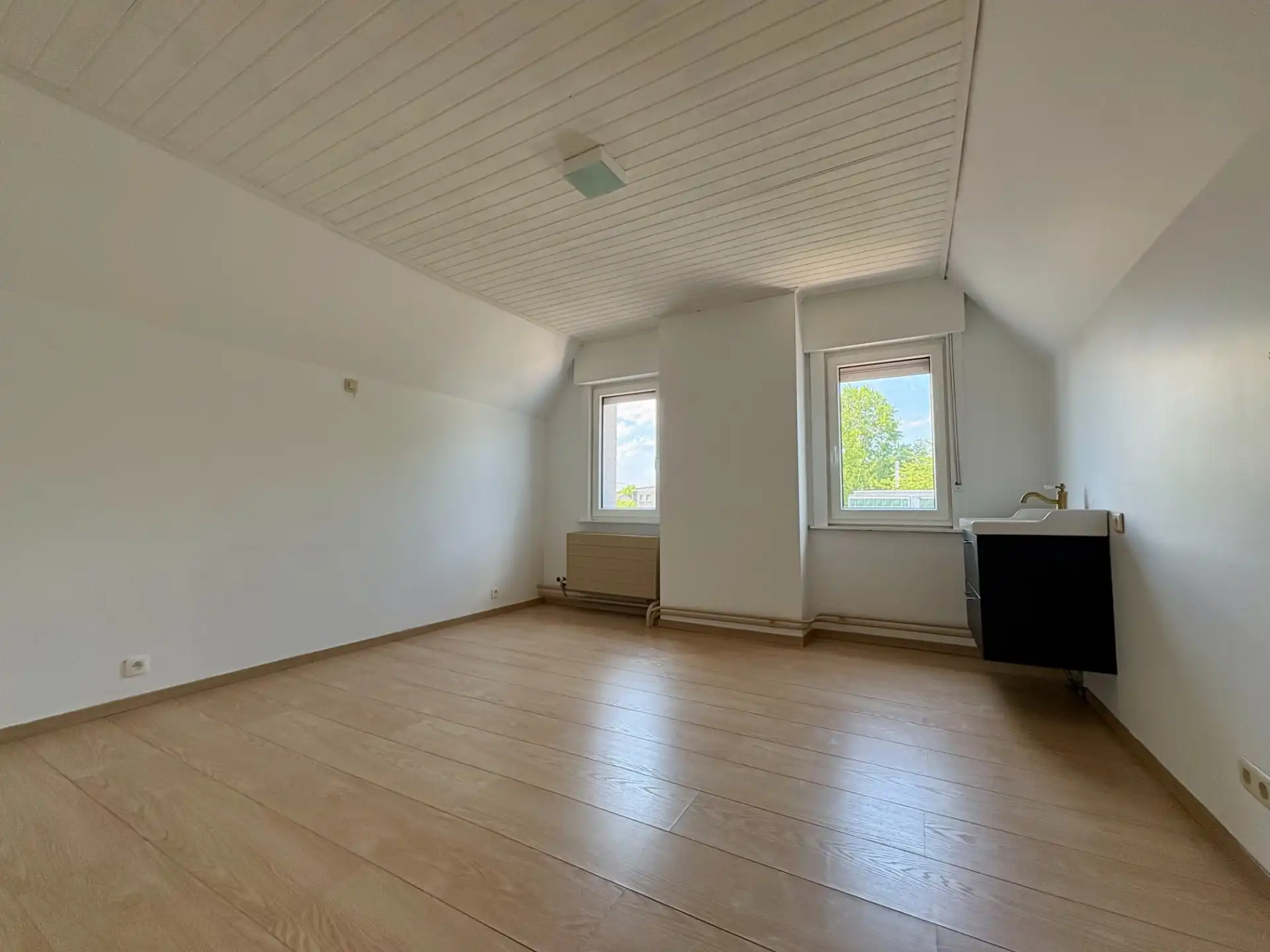 Ruime woning met 3 slaapkamers en autostaanplaats nabij het centrum van Avelgem! foto 11