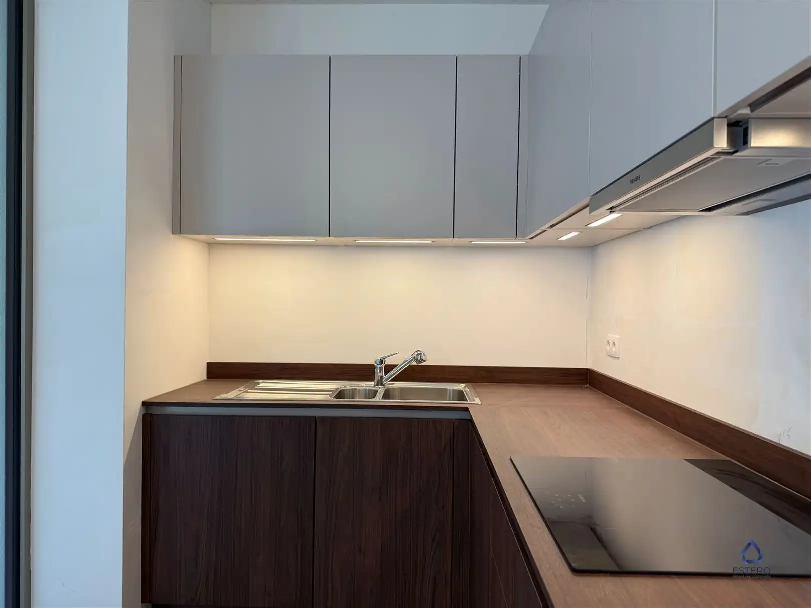 Modern nieuwbouwappt 2-SLK met terras te Tour & Taxis foto 10