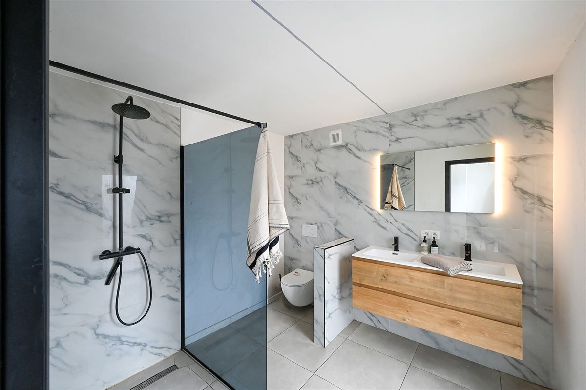 Lichte woning met diepe tuin foto 12