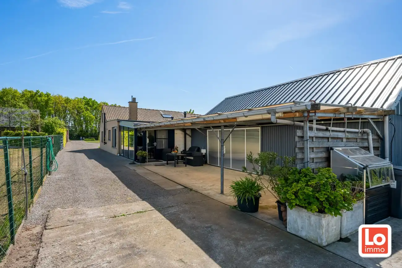 Landelijk gelegen half open woning met ruim bijgebouw (ca. 65m) en grote tuin met open zicht tussen Hijfte en Lochristi. foto 30