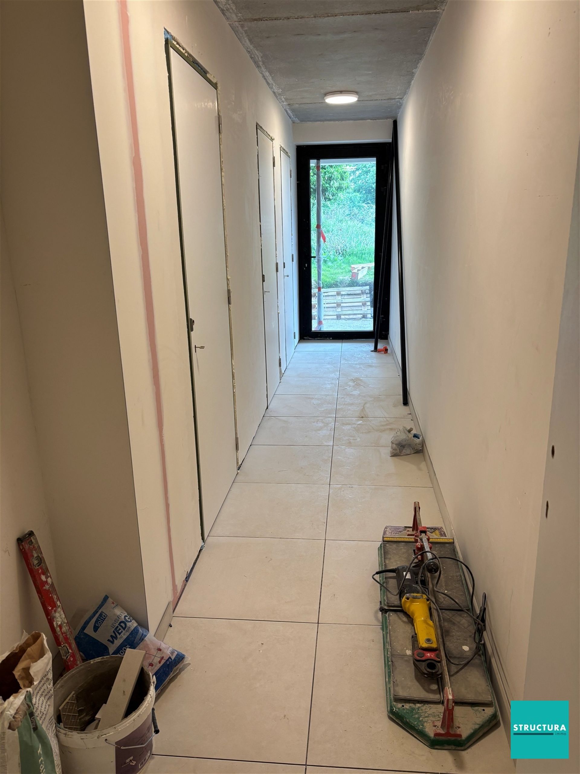 Appartement met 2 slaapkamers en 2 staanplaatsen in centrum Merchtem foto 11