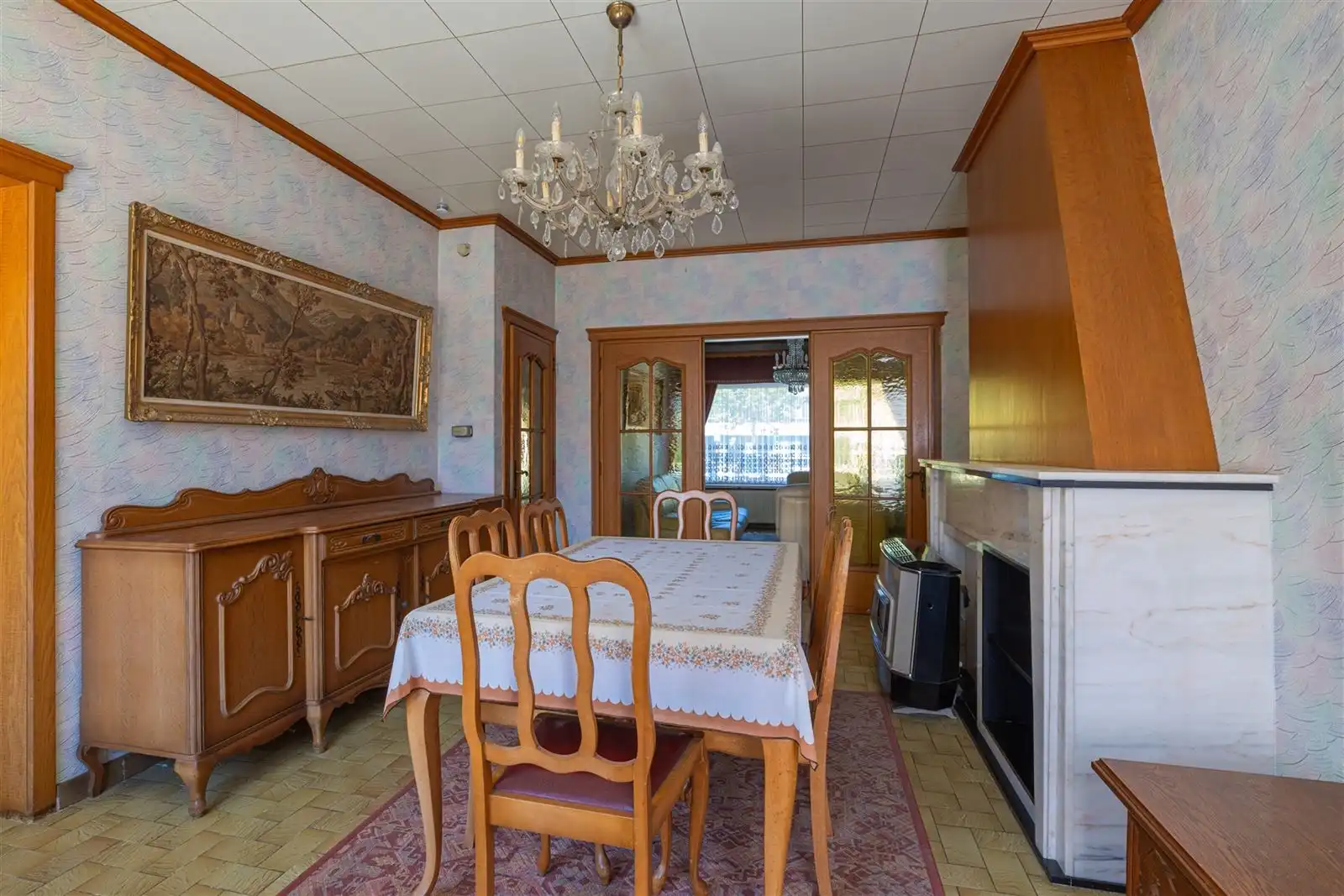 Te renoveren woning mét garage foto 2