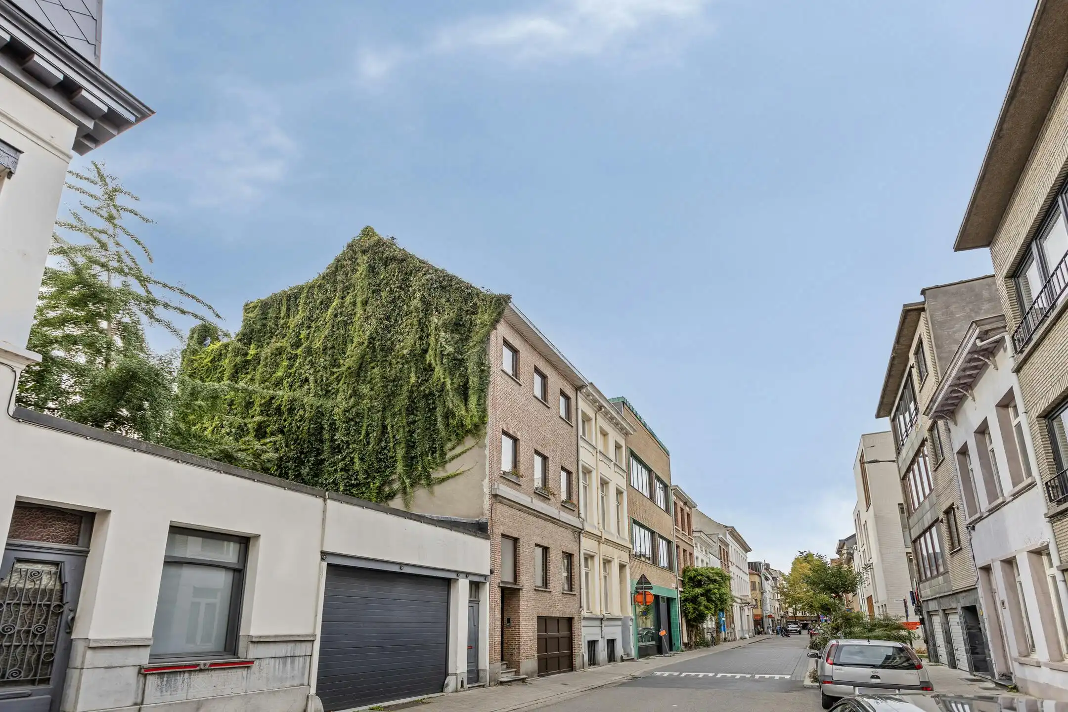 Opbrengsteigendom met garage en 3 appartementen te koop foto 24