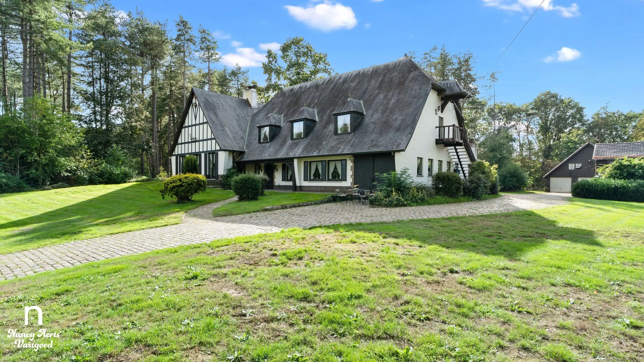 Exclusief landgoed op 1,28 ha met villa en paardenstallen foto 32