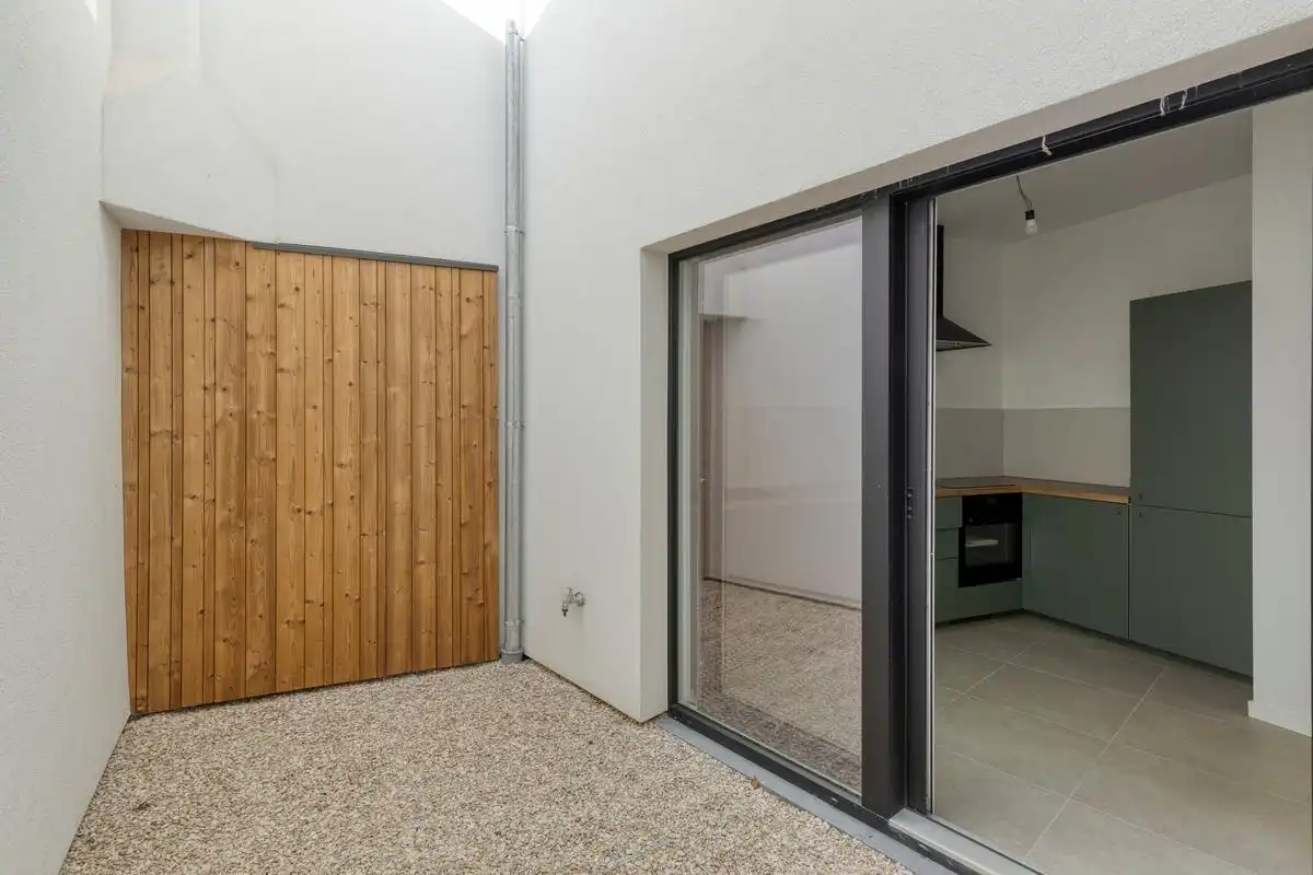 Instapklare totaalrenovatie met 3 slaapkamers in Kortrijk! foto 4