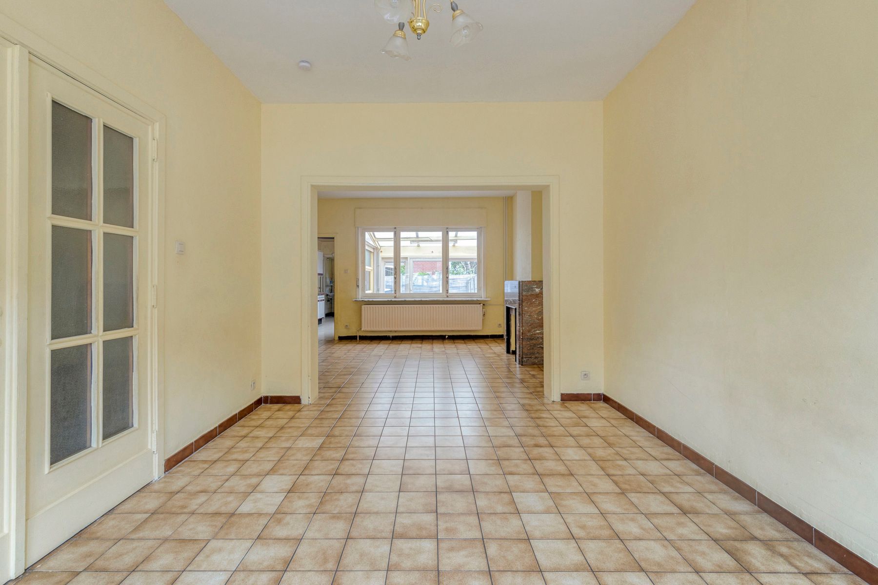 Centraal gelegen rijwoning met 4 slaapkamers foto 4