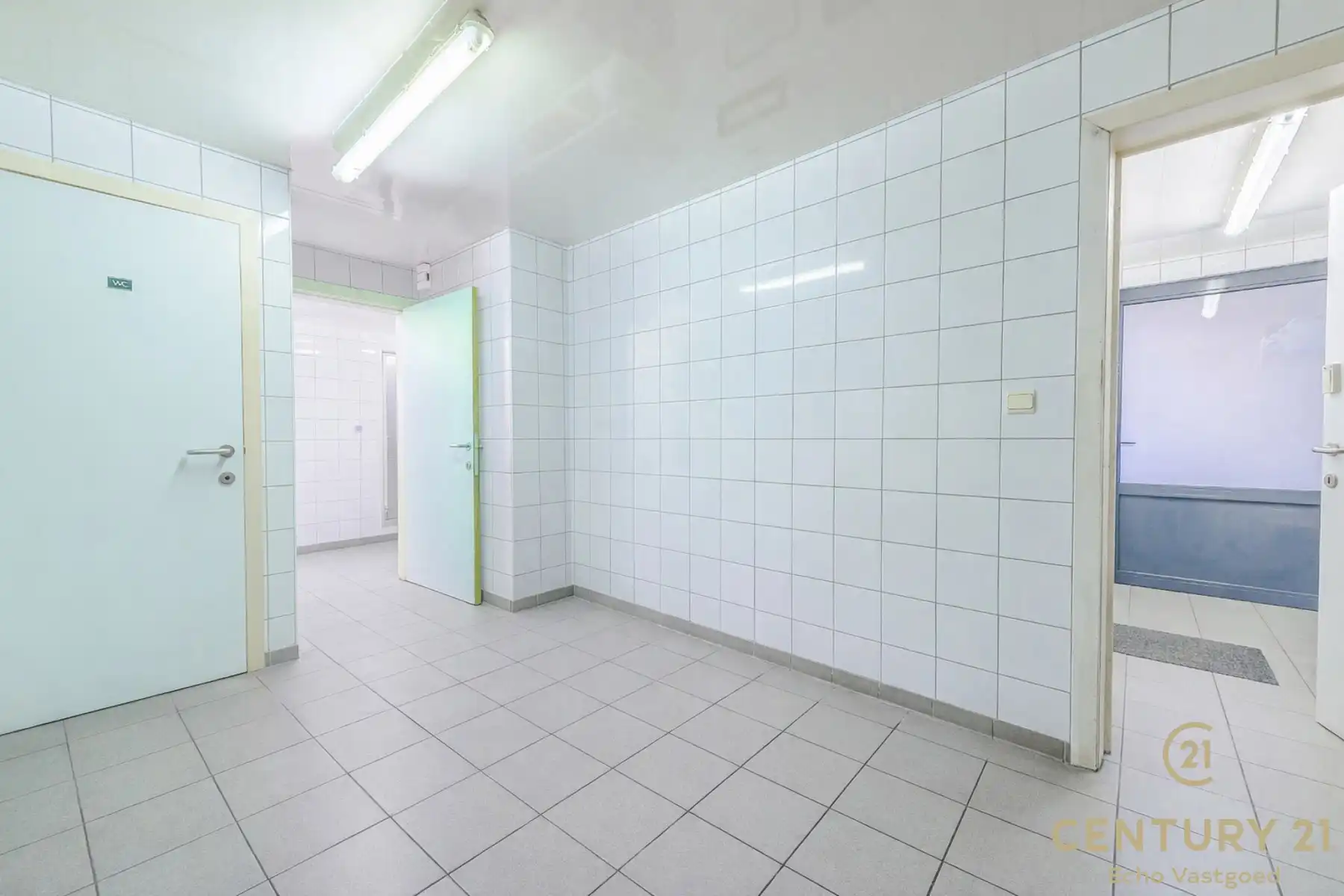 Handelszaak met gerenoveerde woonst op topligging  foto 5