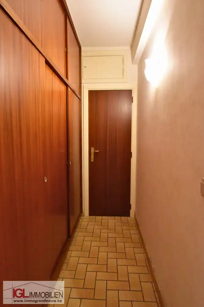 Ruim en rustig gelegen appartement met 2 slaapkamers, terras en garage te huur in Dilbeek foto 9