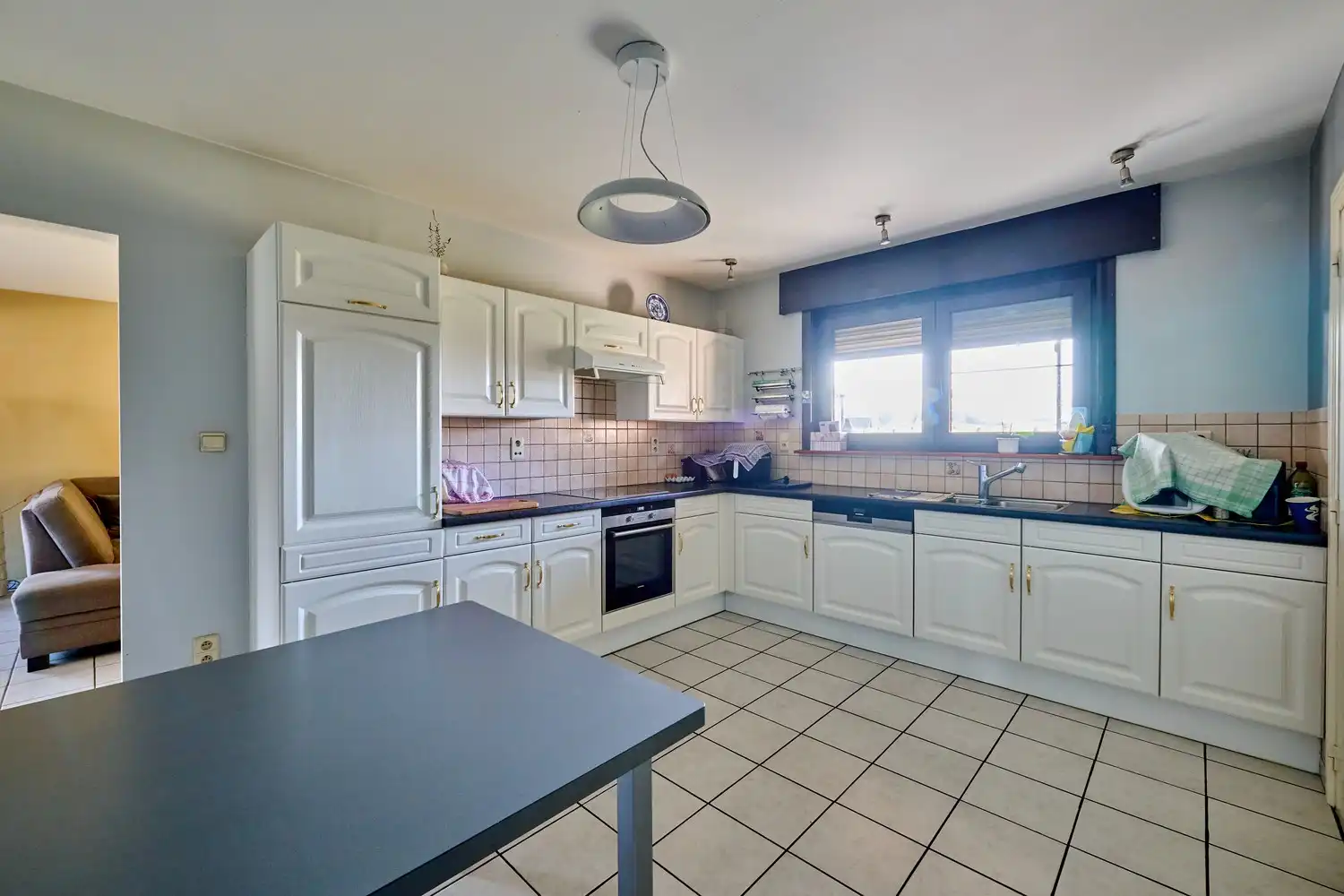 Heel goed onderhouden landhuis met inpandige garage en 3 ruim bemeten slaapkamers in landelijke omgeving foto 9