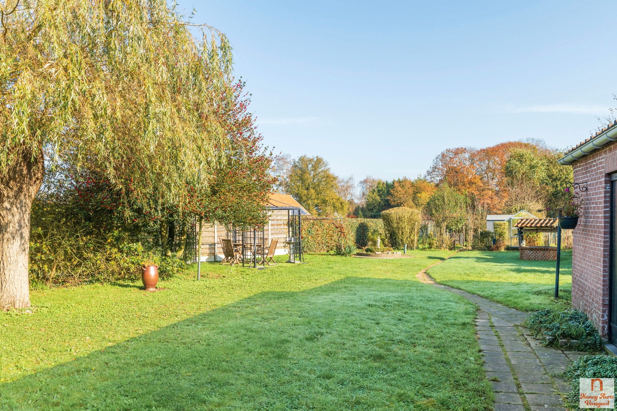 Sfeervolle gezinswoning met zonnige tuin in Paal foto 4