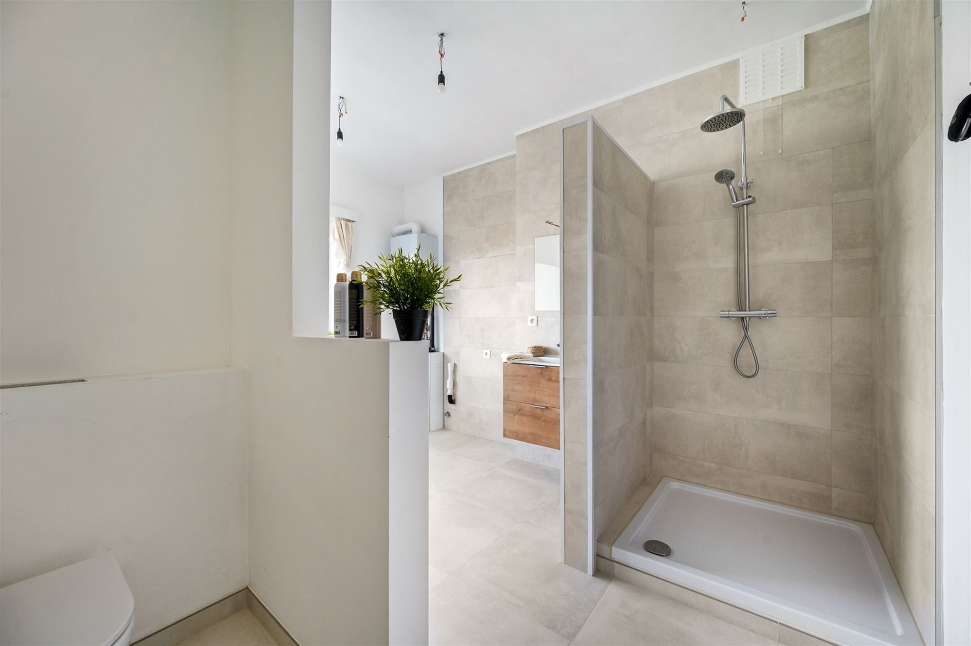 Gerenoveerd en lichtrijk appartement te Mechelen foto 6