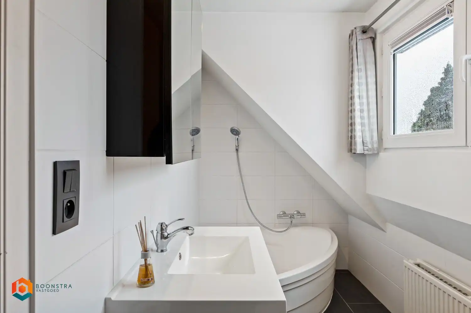 Instapklare rijwoning in centrum Heist foto 14