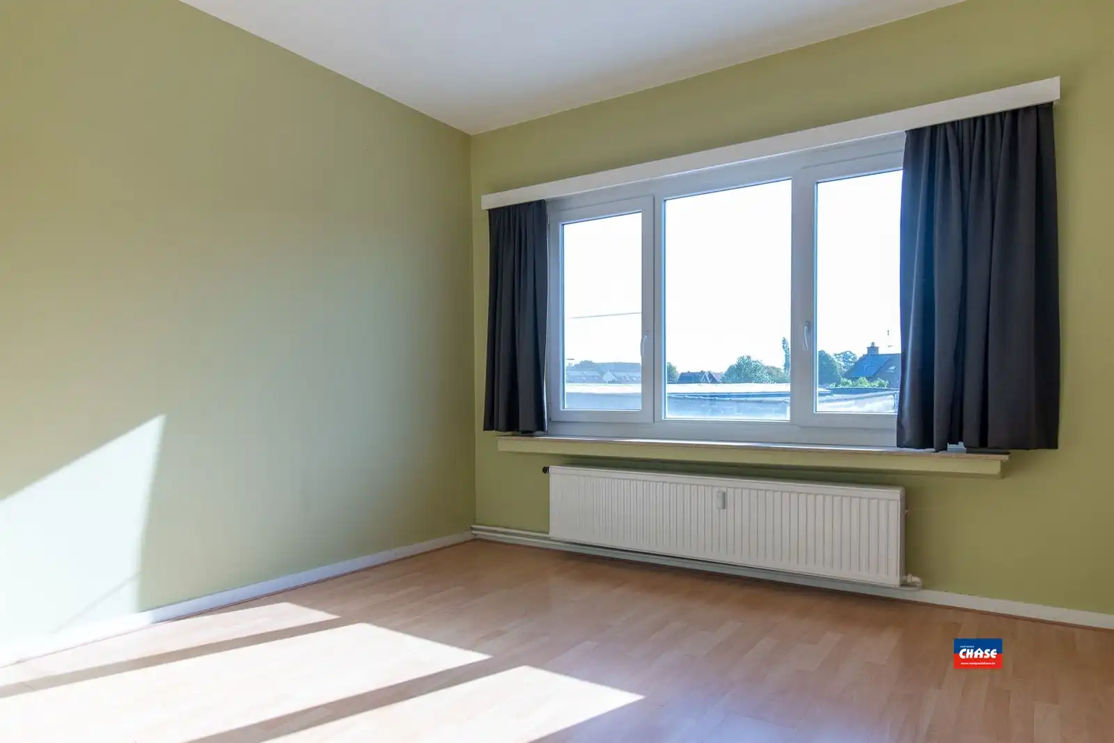 Lichtrijk appartement met terras op de eerste verdieping foto 9