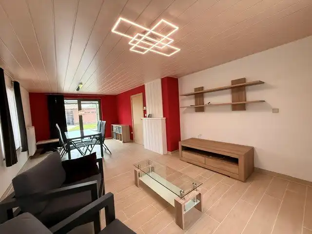 Halfopen woning met 3 slaapkamers, inpandige garage en mooie tuin in Kleine Brogel. foto 8