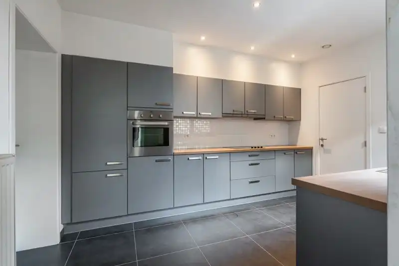 Gelijkvloers appartement met 2 slaapkamers, autostaanplaats en terras foto 7
