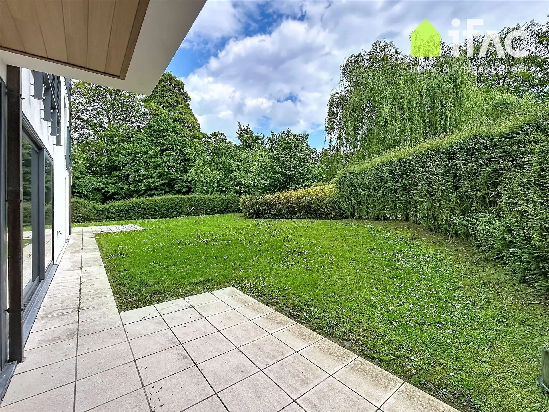 Exclusief gelijkvloers appartement met 2sk en privé tuin foto 4