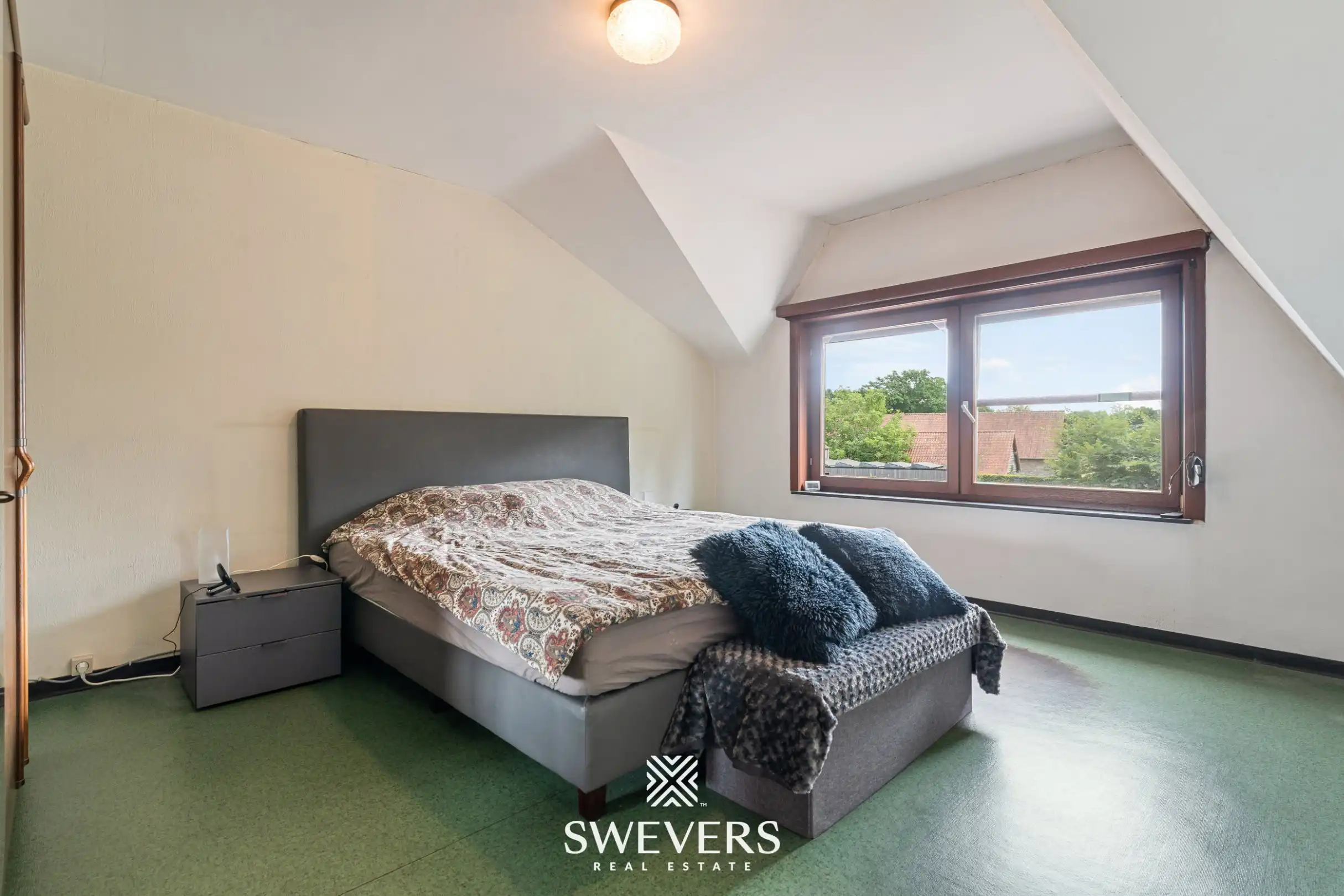 Uitstekend gelegen woning met 4 slaapkamers en mooie tuin foto 27