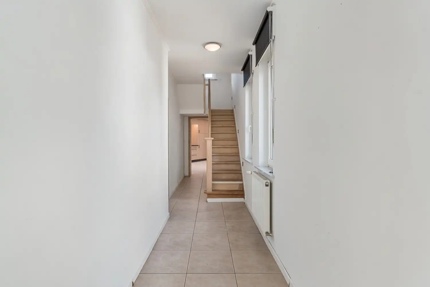 Instapklare, gerenoveerde halfopen bebouwing met 3 slaapkamers op ruim perceel in Sint-Truiden foto 12