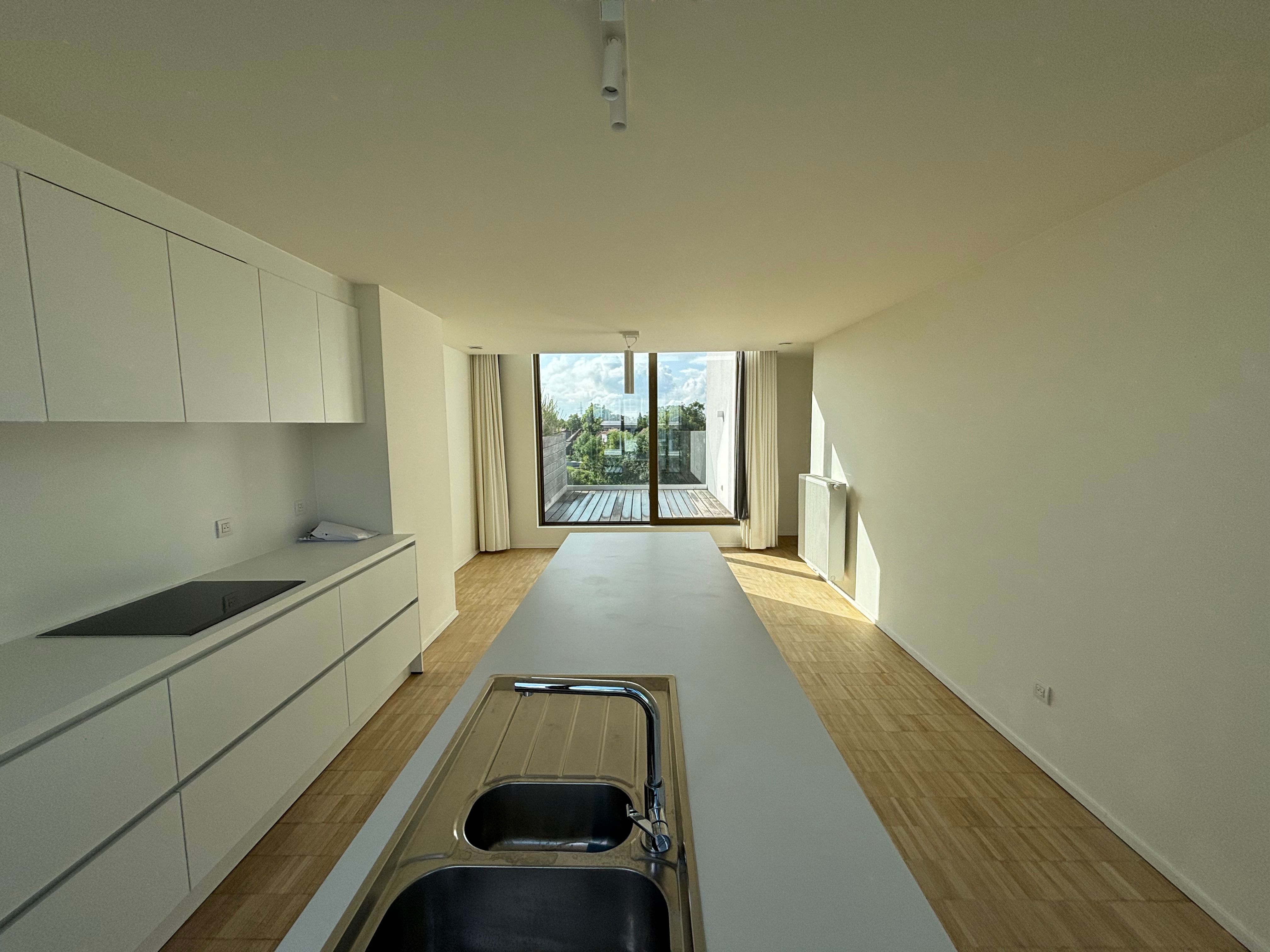Lichtrijke, moderne en energiezuinige penthouse te koop in Roeselare foto 4