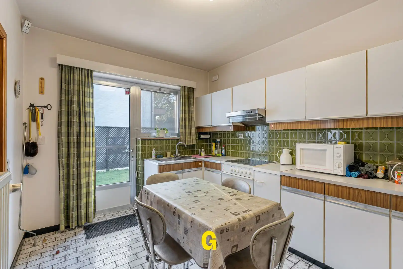 Verzorgde te renoveren vrijstaande bungalow woning op 7a 71ca, rustig en centraal gelegen te Alken foto 10