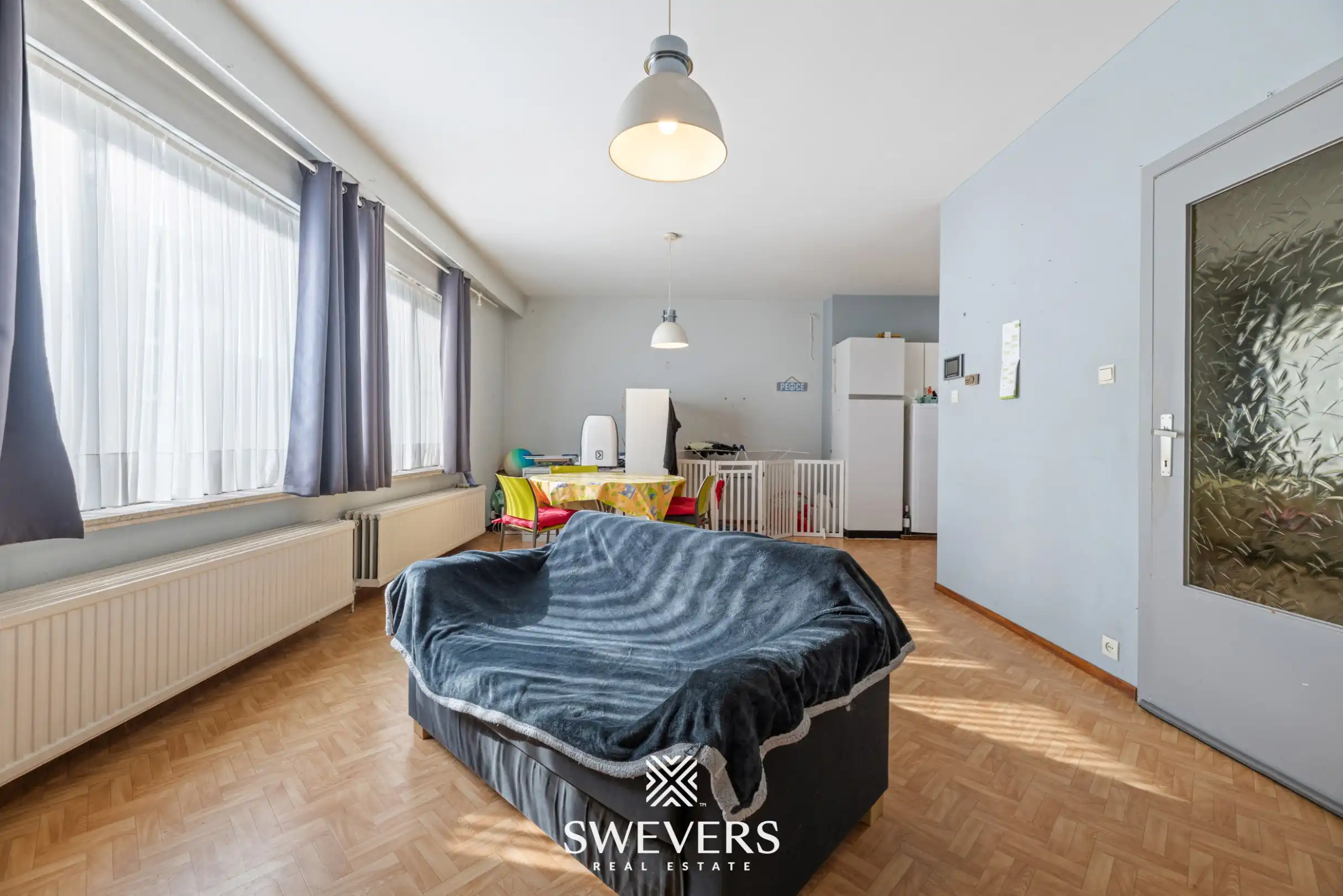 Gelijkvloers appartement met 2 slaapkamers en garagebox in centrum Beringen foto 2