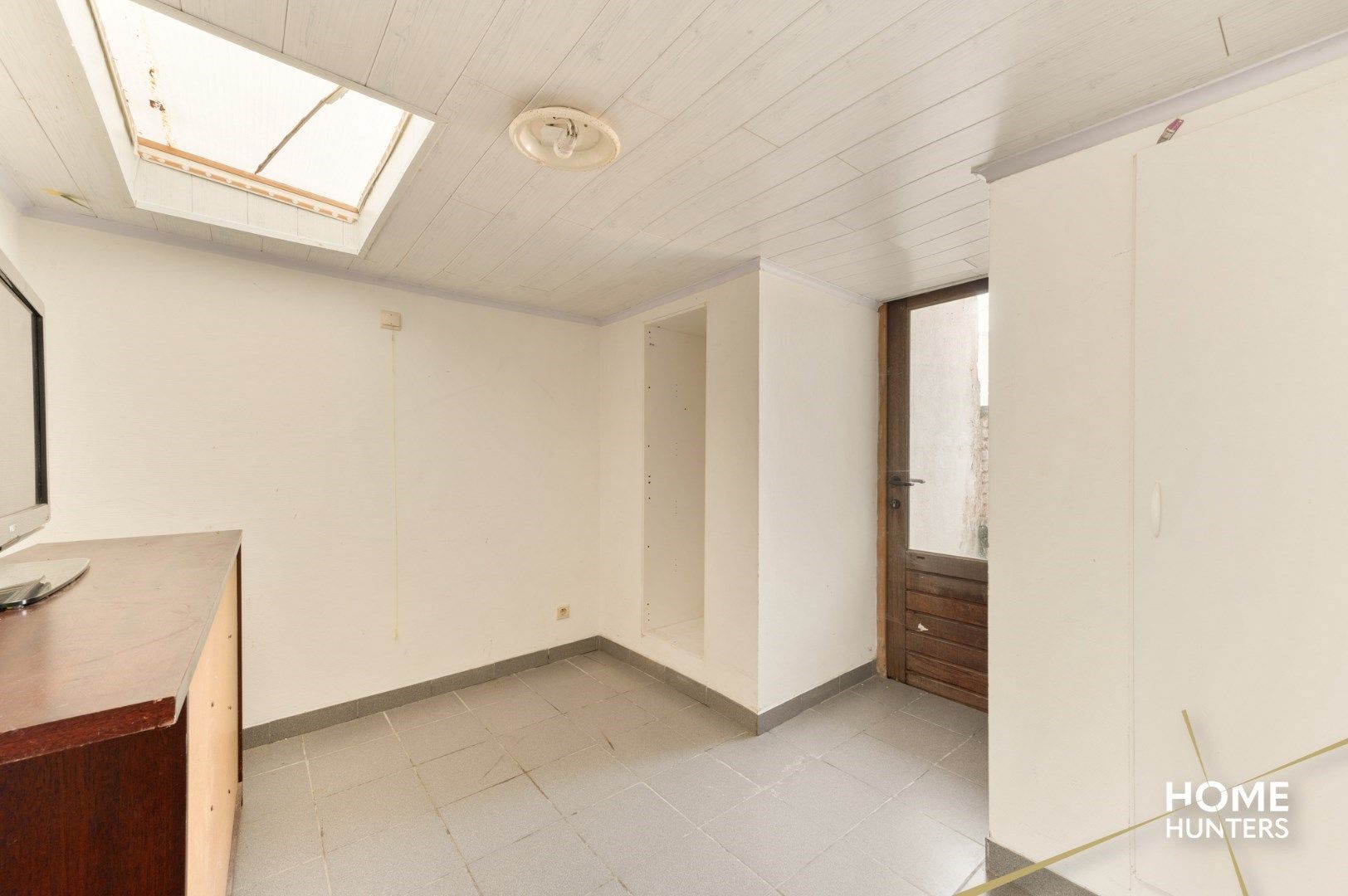 Te renoveren woning in het centrum van Ieper foto 12