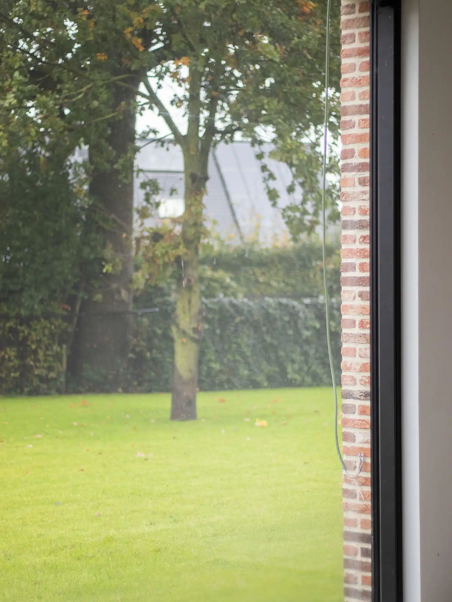 Hoogwaardig afgewerkt gelijkvloersappartement met tuin foto 15