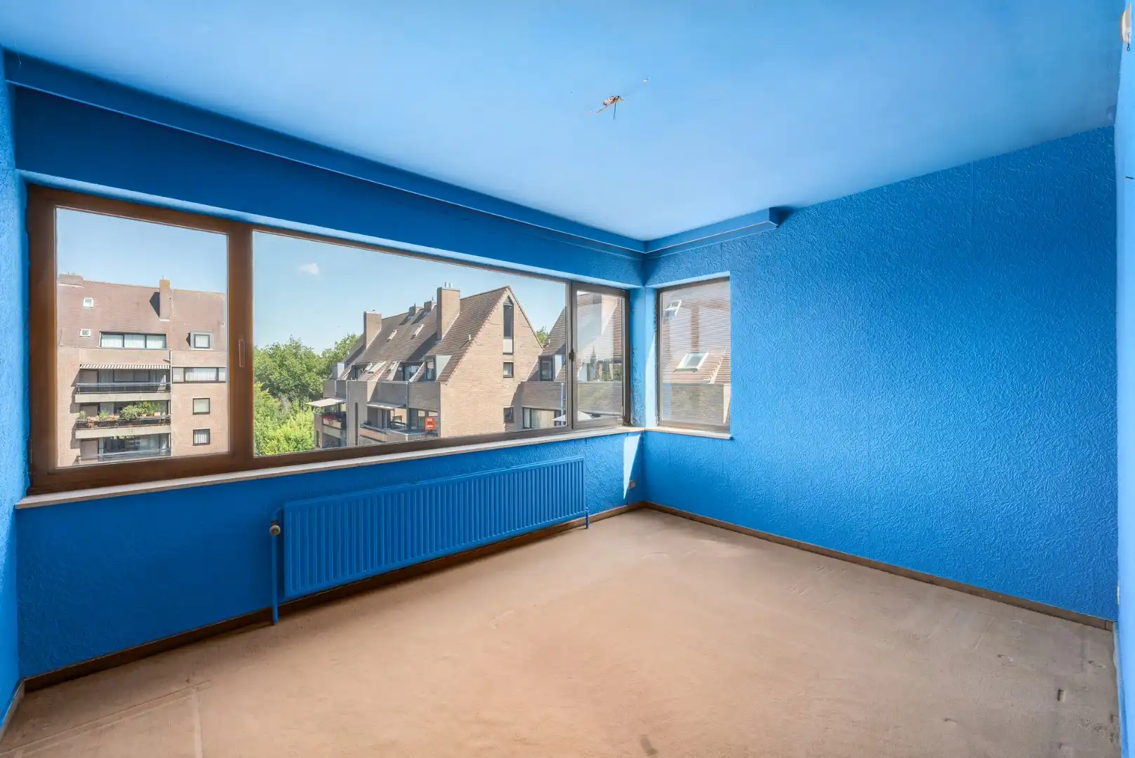 Te renoveren lichtrijk appartement met garage te Kristus-Koning (Brugge) foto 7