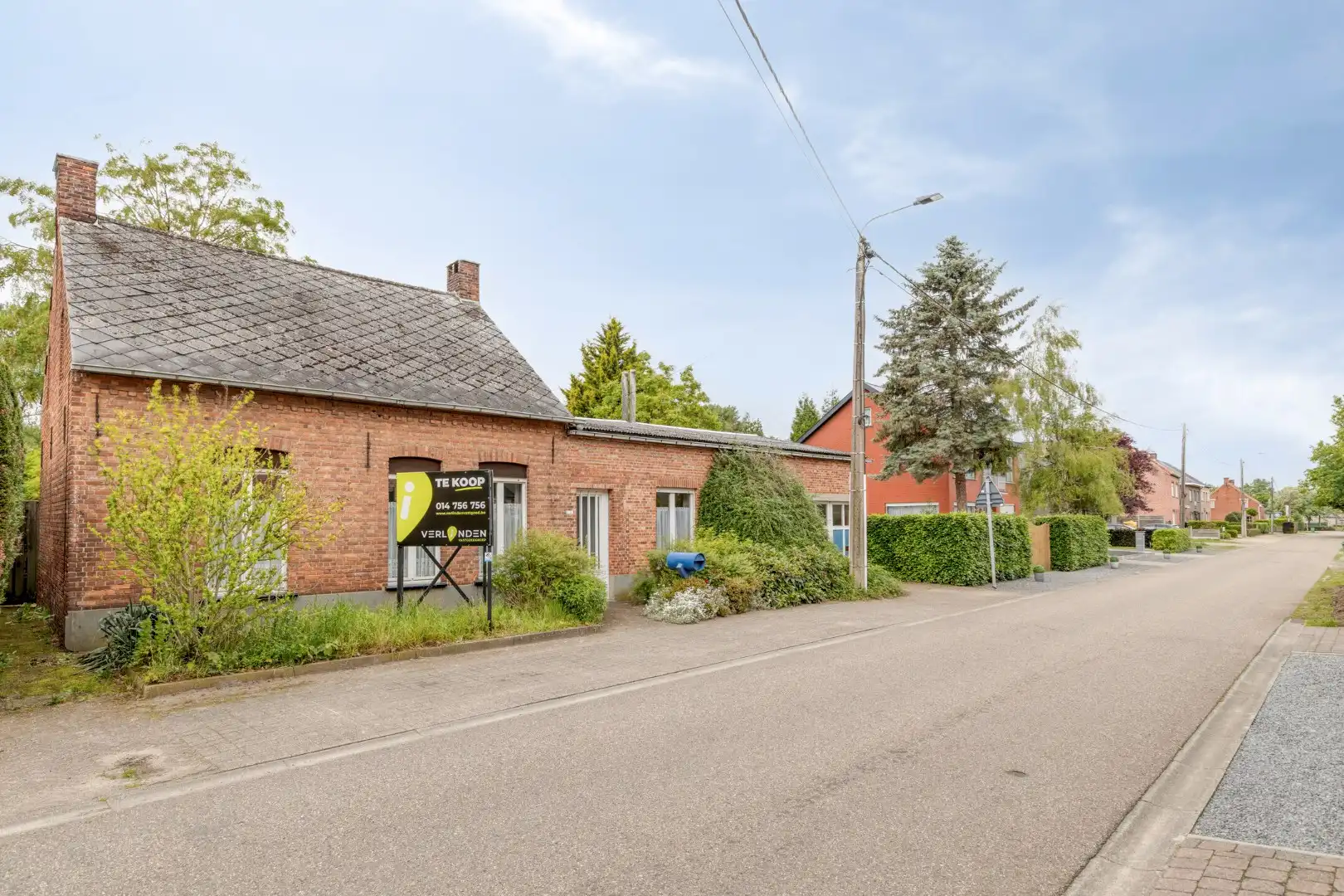 Hoofdfoto van de publicatie: Te renoveren woning, rustig gelegen op een zonnig perceel van 767 m² te Olen-Centrum !