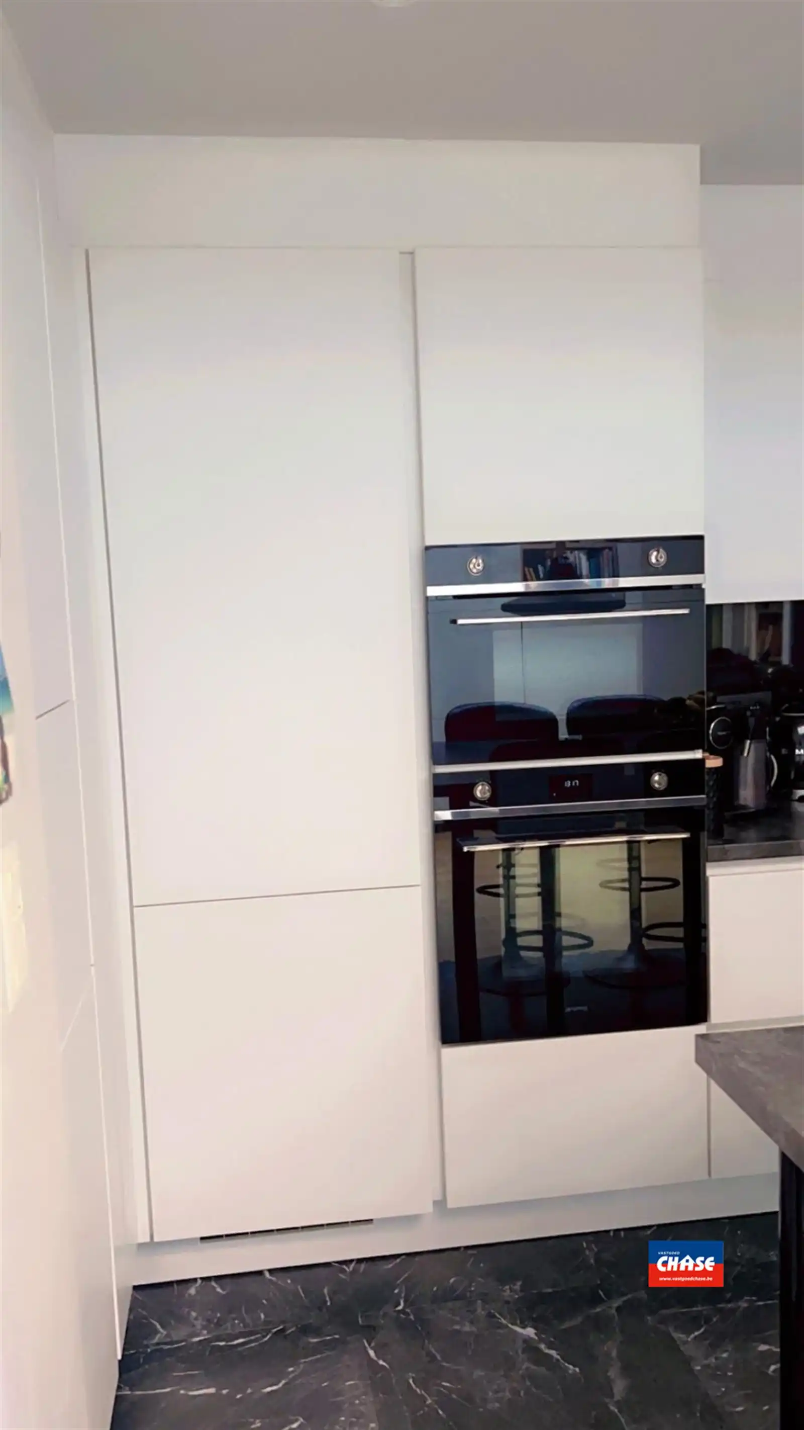 Instapklare bel-étage met 2 slpks, garage en tuin foto 11