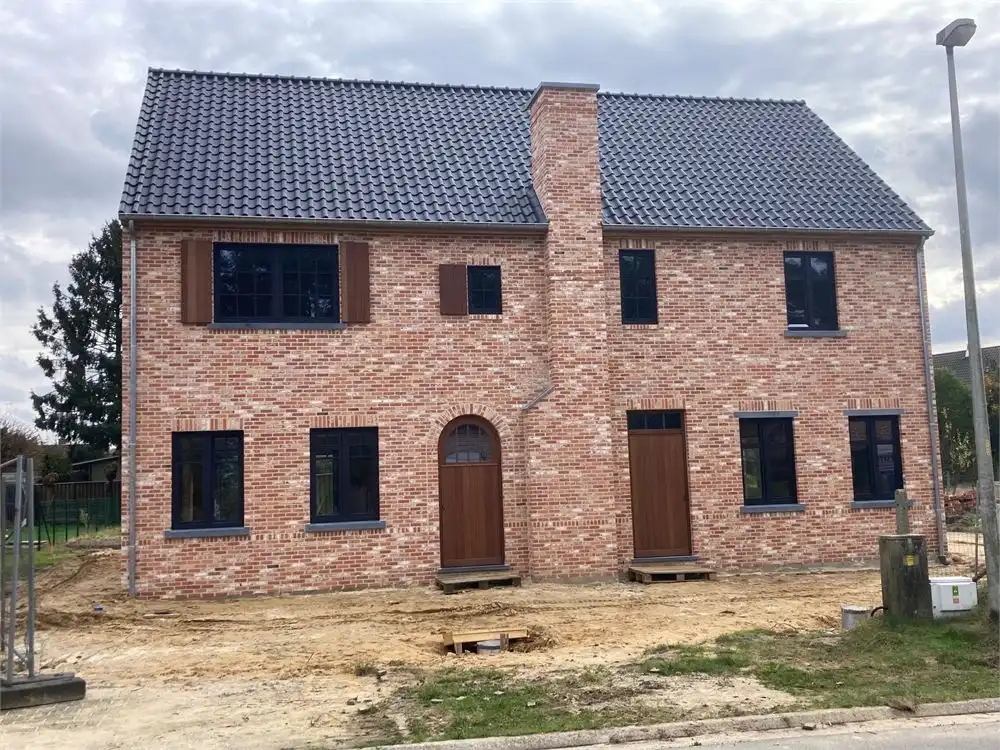 2 charmante herenwoningen op percelen van ca 3are foto 2