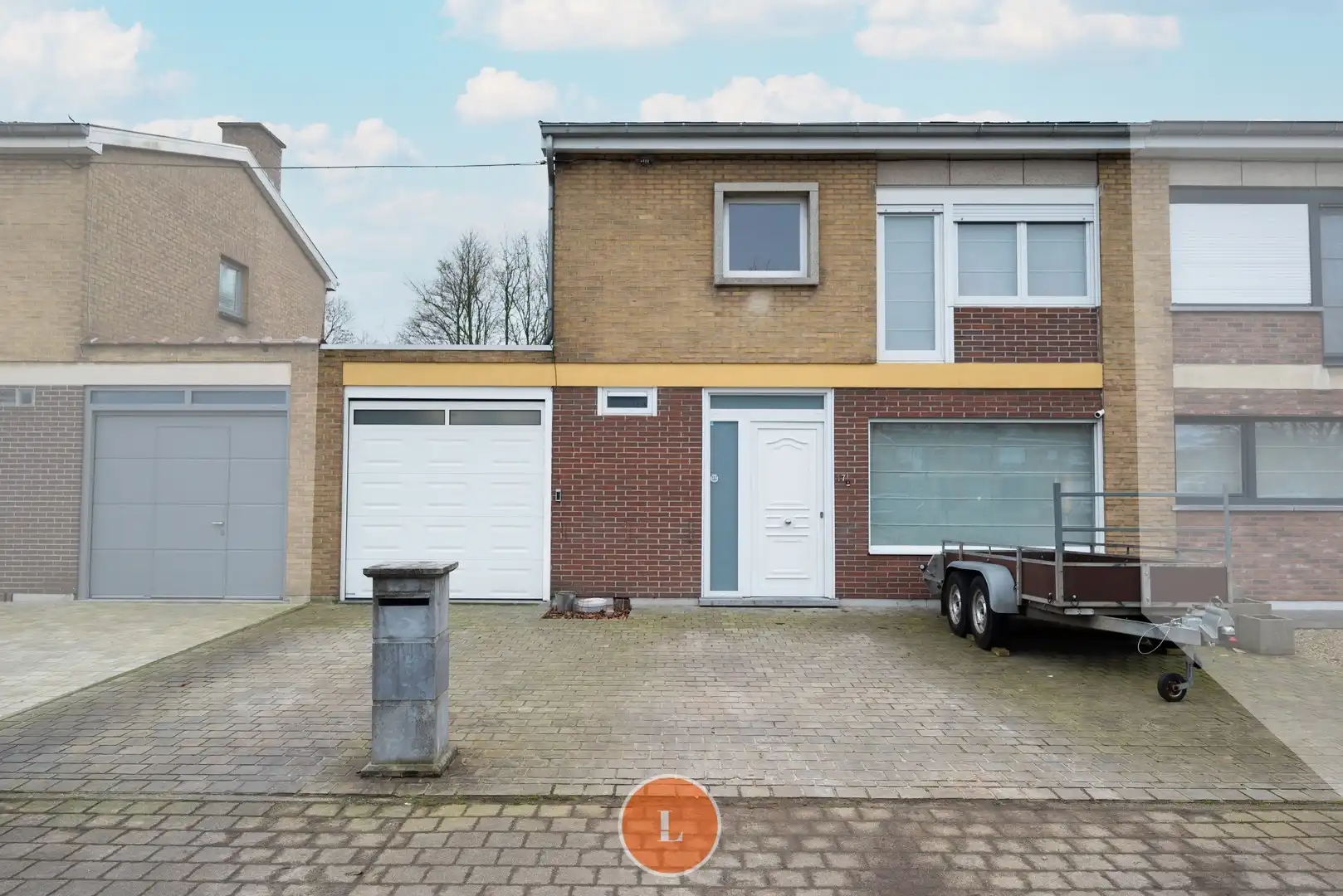 te renoveren woning in Moorsele met garage en tuin foto {{pictureIndex}}