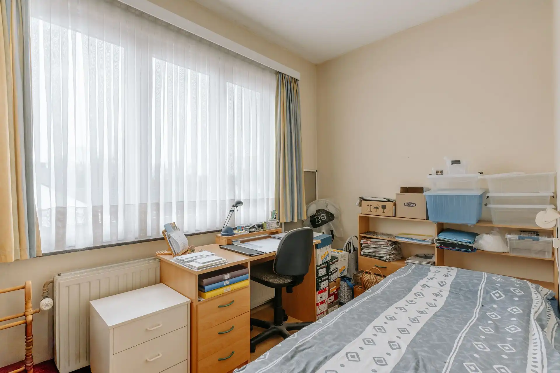 Ruim 3-slaapkamerappartement met karakter en autostaanplaats foto 15