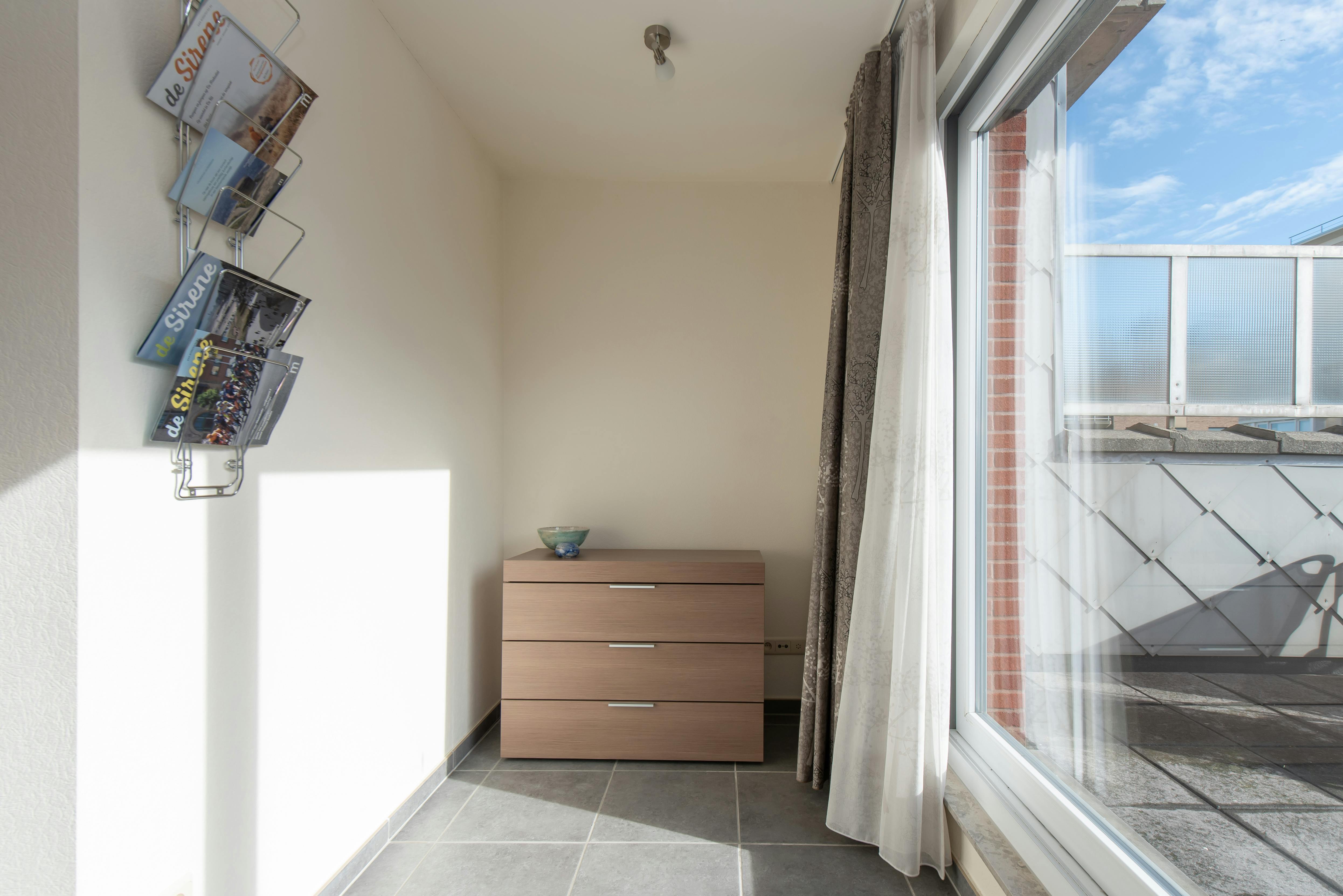 Zuidgerichte penthouse studio met ruime terrassen op topligging! foto 16