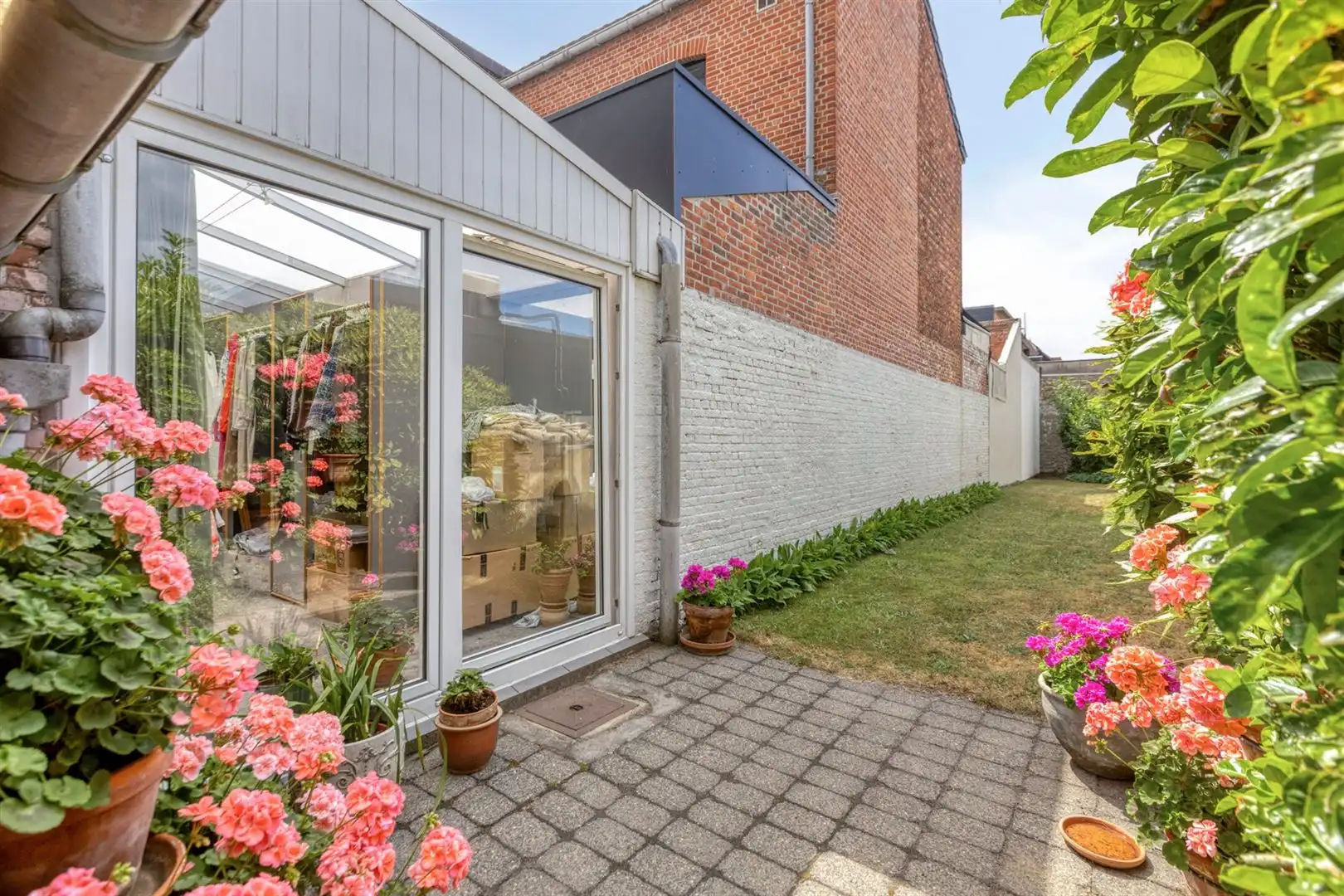 TE KOOP: Handelshuis met ruime woonst in het centrum van Leopoldsburg! foto 28