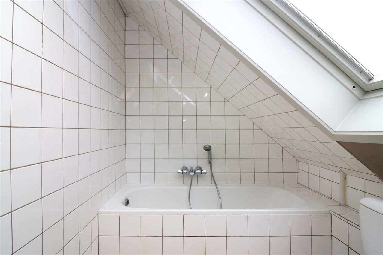 Centraal gelegen appartement met 3 slpk., garage en terras foto 26